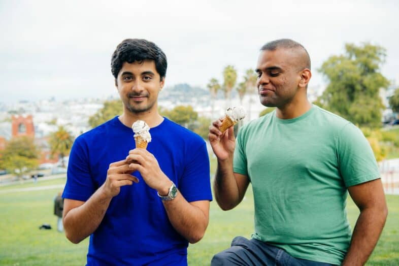 two men eating ice cream