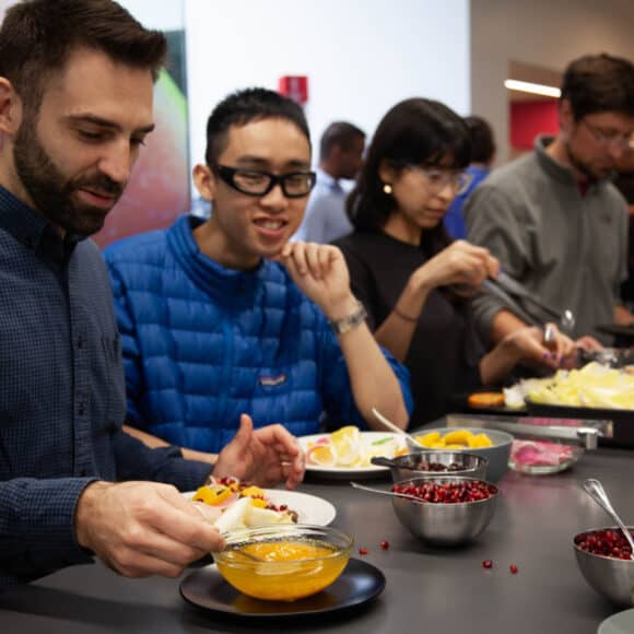 Group of people eating at a table